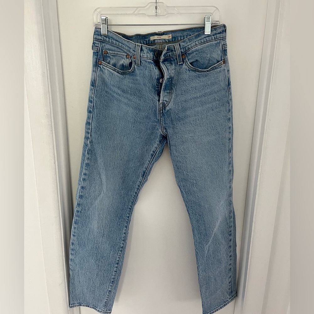 Light wash Levi wedgie jeans. Lightly worn.